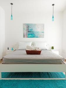 מיטה או מיטות בחדר ב-Kolossoi Guest House