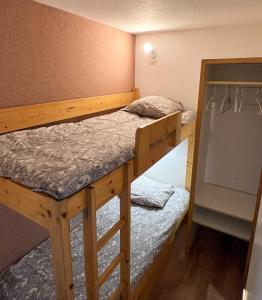 Posteľ alebo postele v izbe v ubytovaní 2 Bedrooms / Center Val Thorens