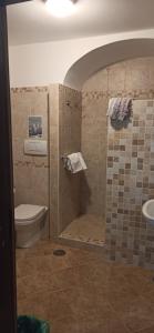 Koupelna v ubytování Hotel 4 Stagioni