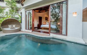 Bazén v ubytování tanadewa Resort Ubud Bali by Cross Collection nebo v jeho okolí