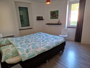 Posteľ alebo postele v izbe v ubytovaní Chateau de Viviez
