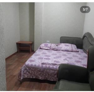 Postel nebo postele na pokoji v ubytování мини-отель "Алатау",хостел