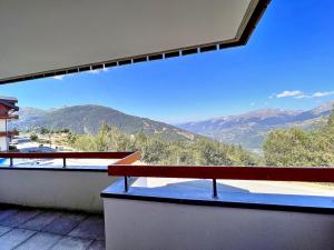 a balcony with a view of the mountains at No 1a, Edelweiss in Landry