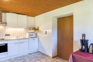 Kuchyň nebo kuchyňský kout v ubytování Ferienwohnung Oberangerhof