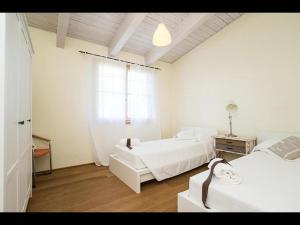 Fotografia z galérie ubytovania Appartament Rosmarino - Cignella Resort v destinácii Osteria Delle Noci