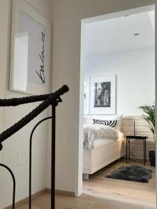 Postel nebo postele na pokoji v ubytování Lieblingsplatz Neusiedl Appartement - Erhol dich gut
