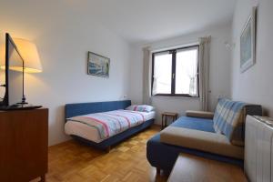 Łóżko lub łóżka w pokoju w obiekcie Apartments Cordasev