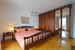 Łóżko lub łóżka w pokoju w obiekcie Apartments Cordasev