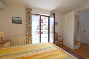 Łóżko lub łóżka w pokoju w obiekcie Apartments Cordasev