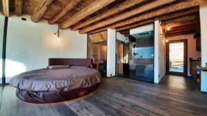 Rúm í herbergi á Chalet Cormignano