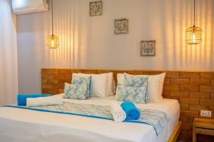 Voodi või voodid majutusasutuse Treasure Villa toas