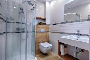 Kúpeľňa v ubytovaní GórSKI Przystanek Apartament Parzenica i Rozeta