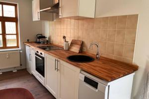 Η κουζίνα ή μικρή κουζίνα στο Ferienwohnung Till Eulenspiegel