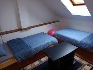 Postel nebo postele na pokoji v ubytování Eva apartman