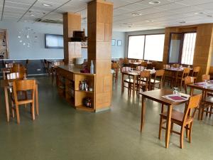 TV a/nebo společenská místnost v ubytování Hostal Meson Pepa