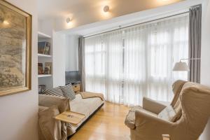 Część wypoczynkowa w obiekcie Tenderia apartment by People Rentals
