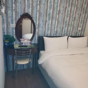 Postel nebo postele na pokoji v ubytování Lucky Star Homestay