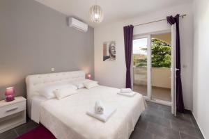 Lova arba lovos apgyvendinimo įstaigoje Villa Green Oasis - Adriatic Luxury Villas