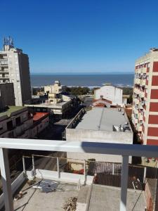a view of a city from a balcony at Panoramico in Santa Teresita