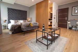 Posteľ alebo postele v izbe v ubytovaní Montalbera Wine Suites