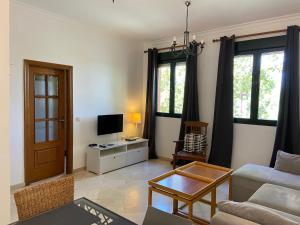 TV a/nebo společenská místnost v ubytování Torneo Atico Premium Apartment