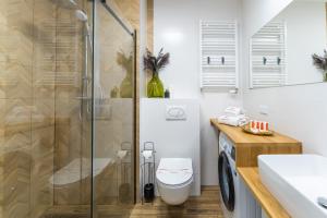 Łazienka w obiekcie Apartament Słoneczny przy morzu z klimatyzacja