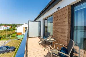Balkon lub taras w obiekcie Apartament Słoneczny przy morzu z klimatyzacja