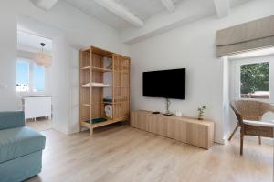 Televízia a/alebo spoločenská miestnosť v ubytovaní Casa Sol 21 Garachico