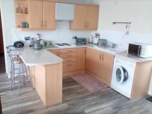 Η κουζίνα ή μικρή κουζίνα στο The Annex - Guest Gardens