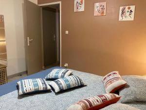 Postel nebo postele na pokoji v ubytování Bungalow Tec-Tec St Leu