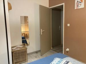 Postel nebo postele na pokoji v ubytování Bungalow Tec-Tec St Leu