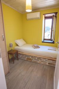 Ein Bett oder Betten in einem Zimmer der Unterkunft Vista Mare