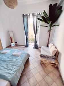 Posteľ alebo postele v izbe v ubytovaní BellaVista, il tuo soggiorno vista mare! + 8 fotografií