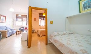 Postel nebo postele na pokoji v ubytování Bonito Apartamento