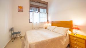 Postel nebo postele na pokoji v ubytování Bonito Apartamento