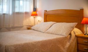 Postel nebo postele na pokoji v ubytování Bonito Apartamento