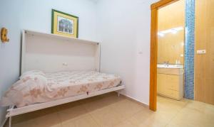 Postel nebo postele na pokoji v ubytování Bonito Apartamento