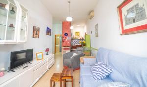 TV a/nebo společenská místnost v ubytování Bonito Apartamento
