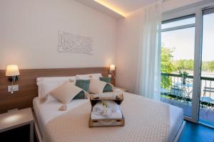 Postel nebo postele na pokoji v ubytování Brichett Deluxe Rooms