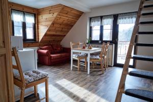 Posezení v ubytování Apartmány Pod Stráni + 29 fotografií
