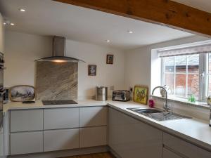 A cozinha ou kitchenette de Moss Hall Barn