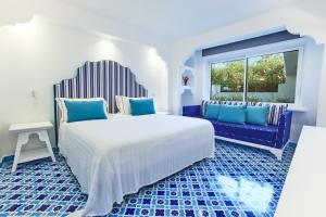 Postel nebo postele na pokoji v ubytování Oleandri Resort Paestum