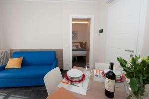 Posezení v ubytování Brichett Deluxe Rooms