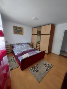 a bedroom with a bed in a room at Apartman Đurđevak ,Banja Koviljača in Banja Koviljača