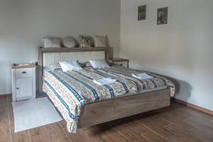 Postel nebo postele na pokoji v ubytování Hauptman apartman