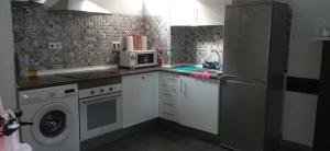 A kitchen or kitchenette at Las súper noches