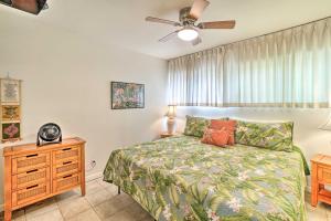 a bedroom with a bed and a ceiling fan at Kaunakakai Escape Heated Pool and Beach Access in Kaunakakai