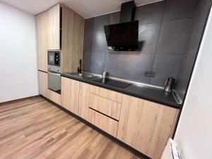 A kitchen or kitchenette at CENTRO - PARKING Free - GUMERFLAT MUSEO VUT-09-234