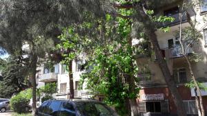 a car parked in front of a building at Kandelaki in Tbilisi City