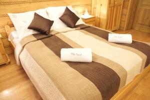 Кровать или кровати в номере Villa Goździk
